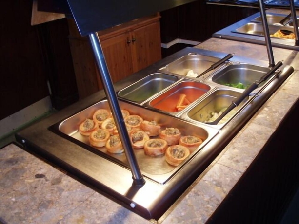 Imagen del bar/restaurante del Hotel The Leaking Well. Foto 4