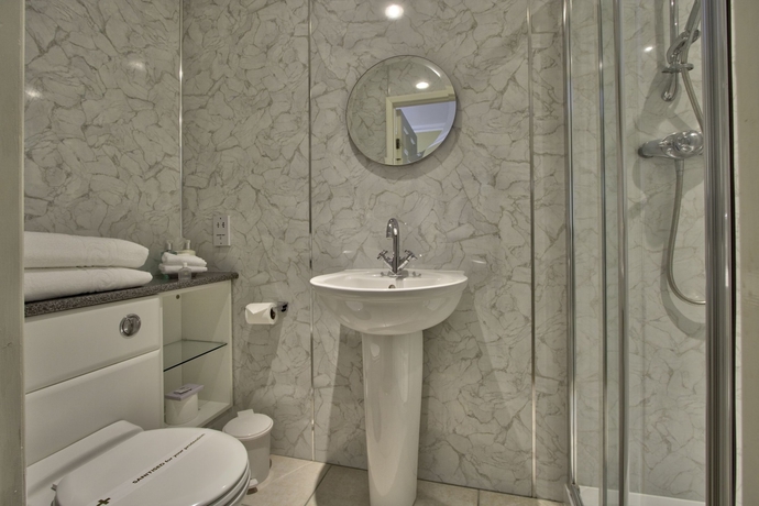 Imagen de la habitación del Hotel The Leconfield. Foto 13