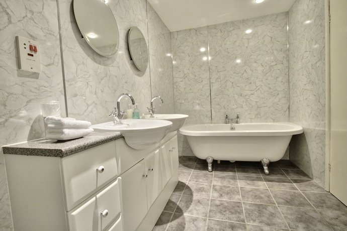 Imagen de la habitación del Hotel The Leconfield. Foto 17