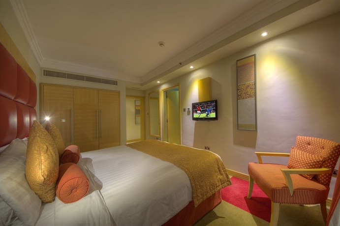 Imagen de la habitación del Hotel The Leela. Foto 6