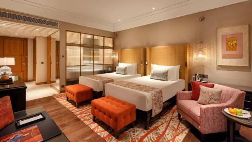 Imagen de la habitación del Hotel The Leela Hyderabad. Foto 16