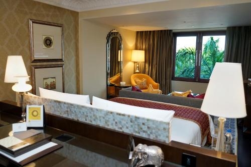 Imagen de la habitación del Hotel The Leela Palace Udaipur. Foto 7