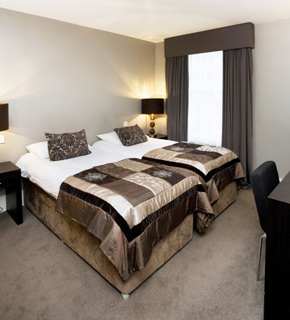 Imagen de la habitación del Hotel The Leeson Inn. Foto 7