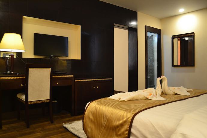 Imagen de la habitación del Hotel The Legend. Foto 8