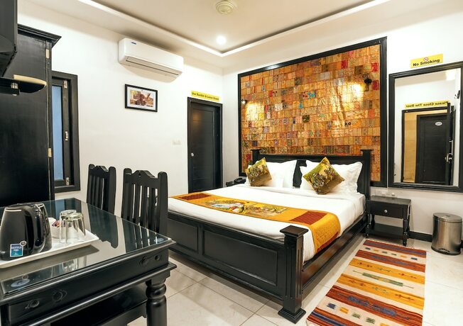 Imagen de la habitación del Hotel The Legend Haveli. Foto 33