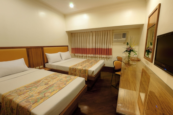 Imagen de la habitación del Hotel The Legend Palawan. Foto 9