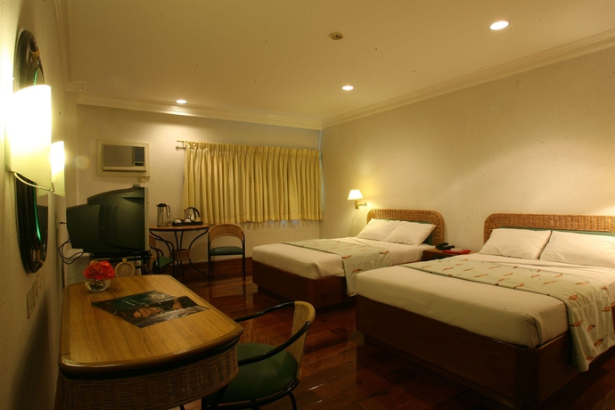 Imagen de la habitación del Hotel The Legend Palawan. Foto 13