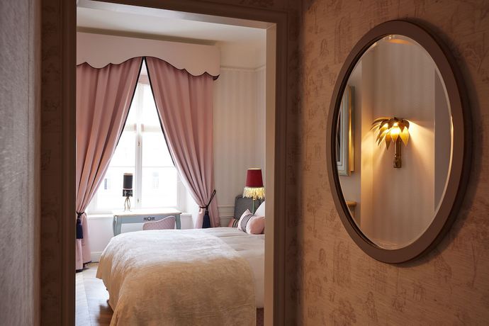 Imagen de la habitación del Hotel The Leo Grand. Foto 13