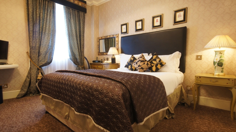 Imagen de la habitación del Hotel The Leonard. Foto 7