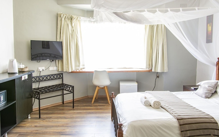 Imagen de la habitación del Hotel The Leslie - Bed and Breakfast. Foto 13