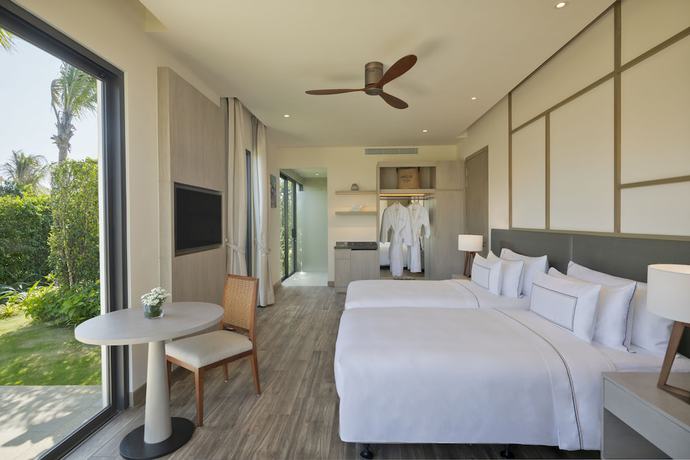 Imagen de la habitación del Hotel The Level Villas at Melia Ho Tram Beach Resort. Foto 7