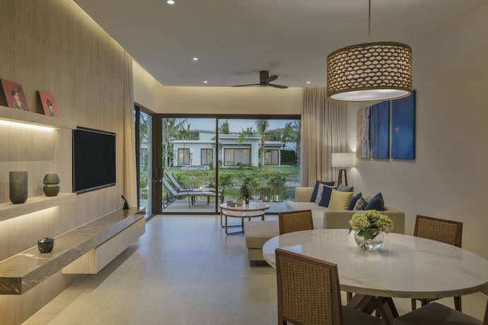 Imagen de la habitación del Hotel The Level Villas at Melia Ho Tram Beach Resort. Foto 12