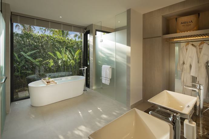 Imagen de la habitación del Hotel The Level Villas at Melia Ho Tram Beach Resort. Foto 17