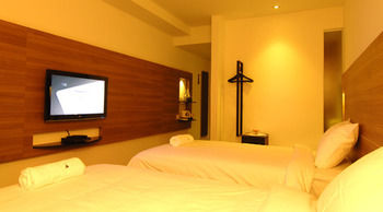 Imagen de la habitación del Hotel The Leverage Business Mergong. Foto 4