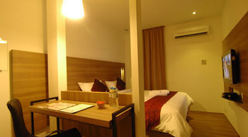 Imagen de la habitación del Hotel The Leverage Business Mergong. Foto 10
