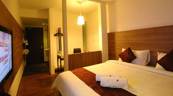 Imagen de la habitación del Hotel The Leverage Business Mergong. Foto 11