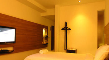 Imagen de la habitación del Hotel The Leverage Business Mergong. Foto 13