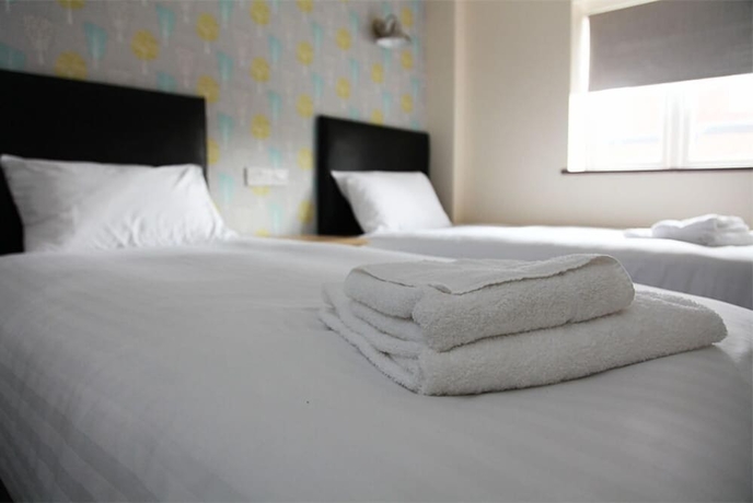 Imagen de la habitación del Hotel The Liberal House. Foto 4