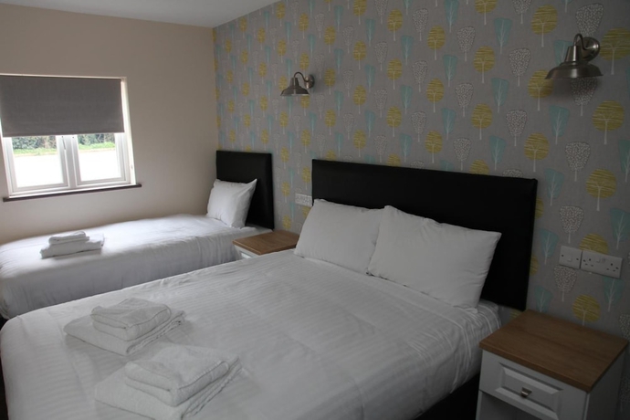 Imagen de la habitación del Hotel The Liberal House. Foto 9