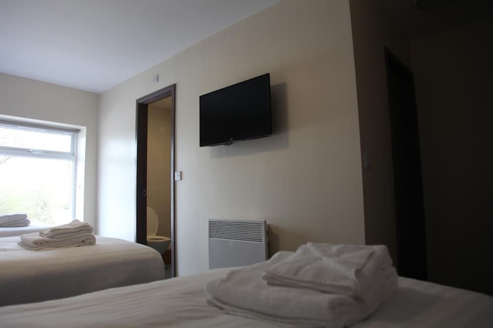 Imagen de la habitación del Hotel The Liberal House. Foto 16
