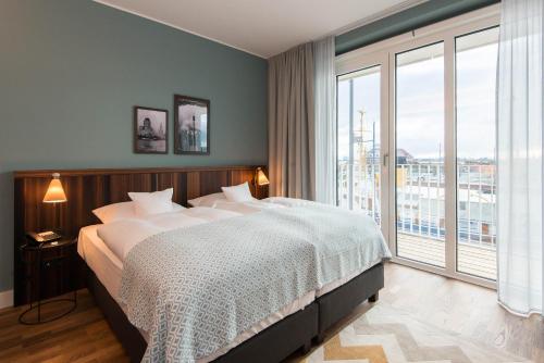 Imagen de la habitación del Hotel The Liberty Bremerhaven, Bw Signature Collection. Foto 7