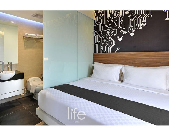 Imagen del bar/restaurante del Hotel The Life Hotels. Foto 4