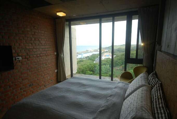 Imagen de la habitación del Hotel The Light Inn. Foto 18