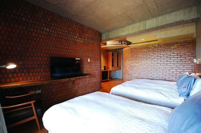 Imagen de la habitación del Hotel The Light Inn. Foto 21