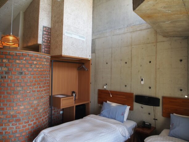 Imagen de la habitación del Hotel The Light Inn. Foto 22