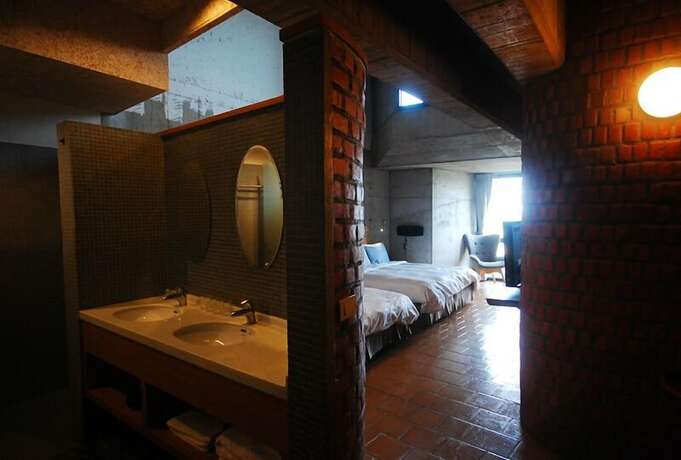 Imagen de la habitación del Hotel The Light Inn. Foto 24