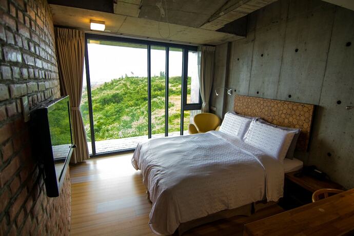 Imagen de la habitación del Hotel The Light Inn. Foto 28