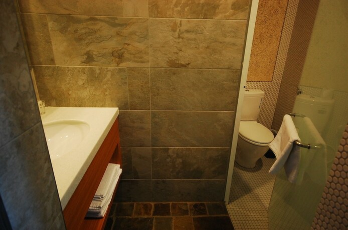 Imagen de la habitación del Hotel The Light Inn. Foto 30