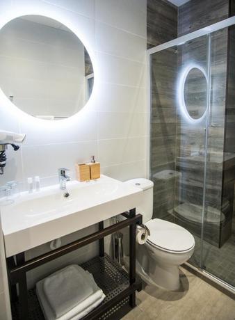 Imagen de la habitación del Hotel The Lights City Rooms. Foto 7