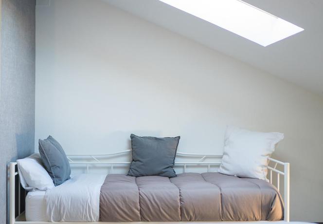 Imagen de la habitación del Hotel The Lights City Rooms. Foto 10