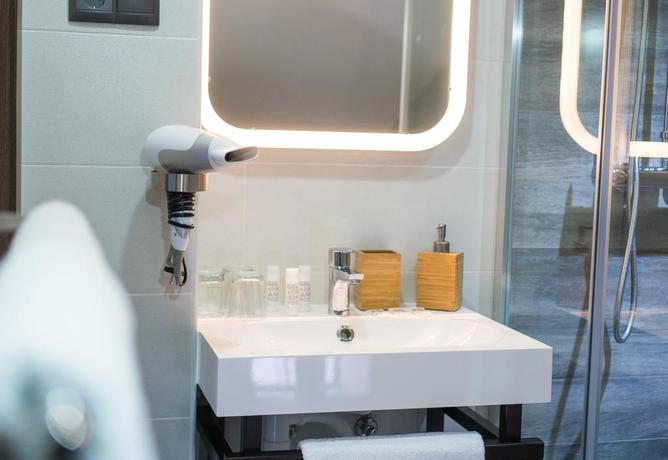 Imagen de la habitación del Hotel The Lights City Rooms. Foto 13