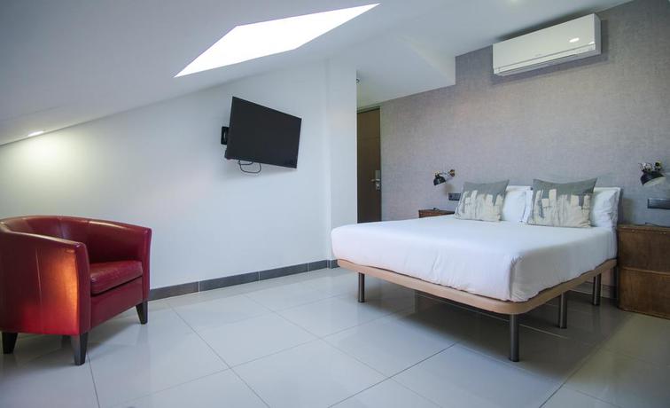 Imagen de la habitación del Hotel The Lights City Rooms. Foto 14