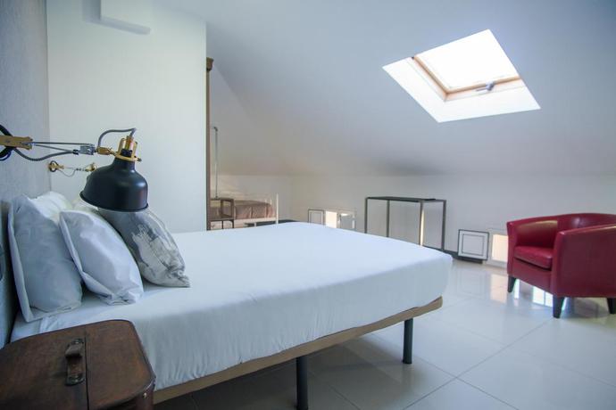 Imagen de la habitación del Hotel The Lights City Rooms. Foto 15