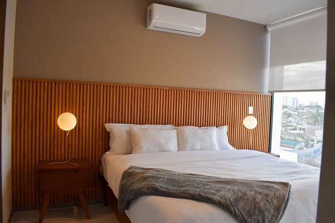 Imagen de la habitación del Hotel The Ligthouse. Foto 9