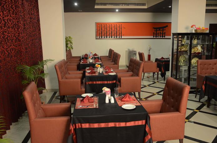 Imagen del bar/restaurante del Hotel The Lily, Dispur. Foto 2