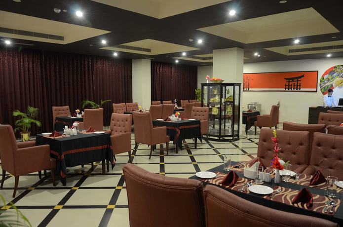 Imagen del bar/restaurante del Hotel The Lily, Dispur. Foto 3