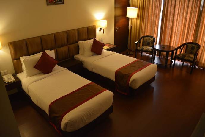 Imagen de la habitación del Hotel The Lily, Dispur. Foto 14