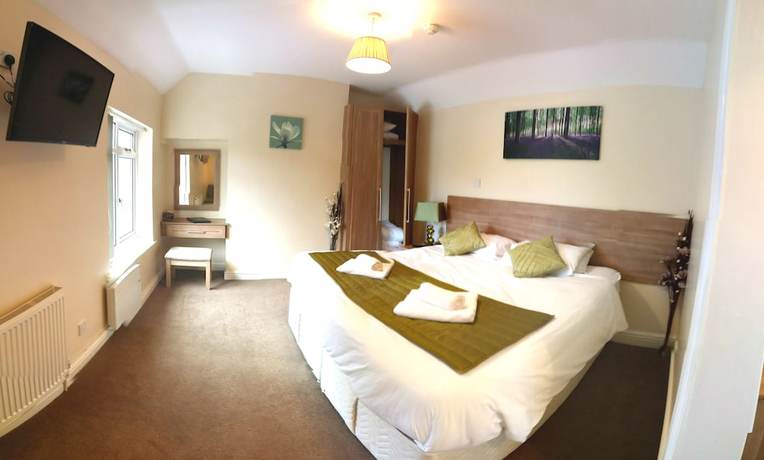 Imagen de la habitación del Hotel The Limes Country Lodge. Foto 7