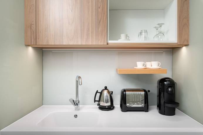 Imagen de la habitación del Hotel The Lincoln Suites. Foto 3