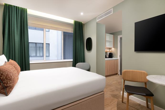 Imagen de la habitación del Hotel The Lincoln Suites. Foto 9