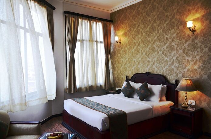 Imagen de la habitación del Hotel The Lindsay. Foto 21