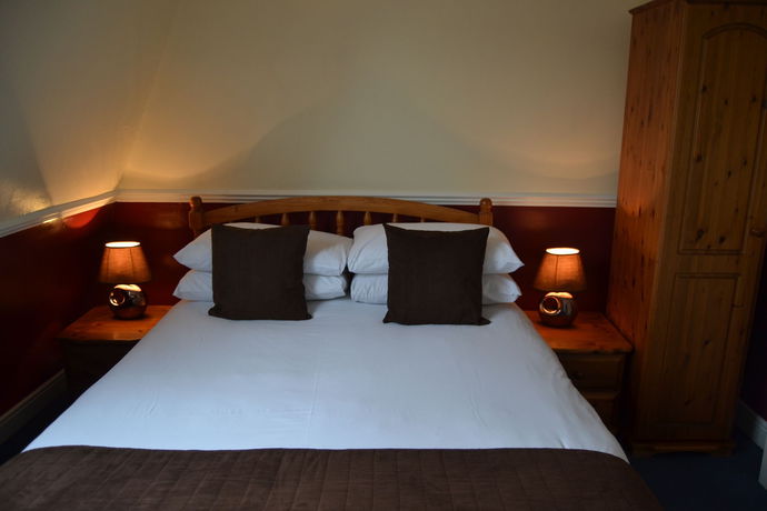 Imagen de la habitación del Hotel The Lindum. Foto 6