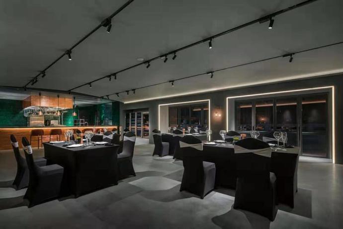 Imagen del bar/restaurante del Hotel The Linow Hotel Xi'an. Foto 2