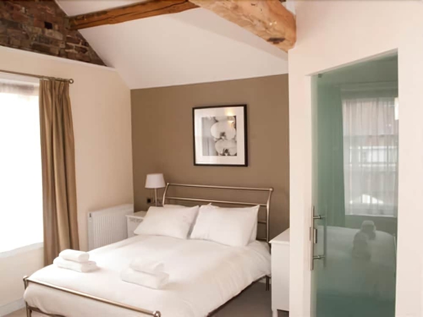 Imagen de la habitación del Hotel The Lion. Foto 8