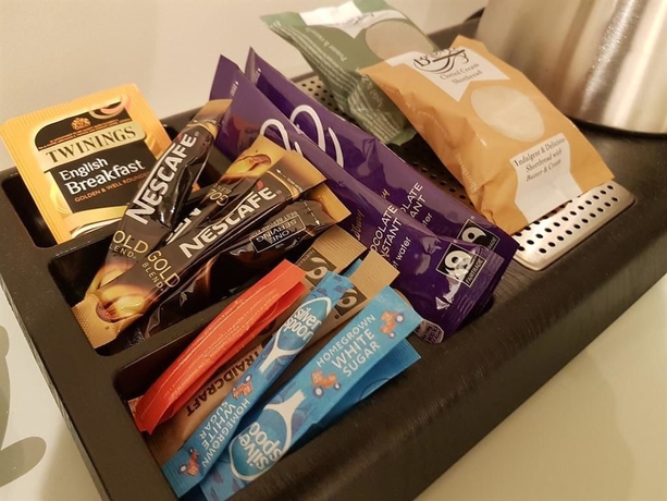 Imagen de la habitación del Hotel The Lion. Foto 18