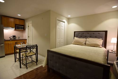 Imagen de la habitación del Hotel The Lion Inn and Suites. Foto 7